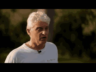 a man wearing a white shirt that says la riviera